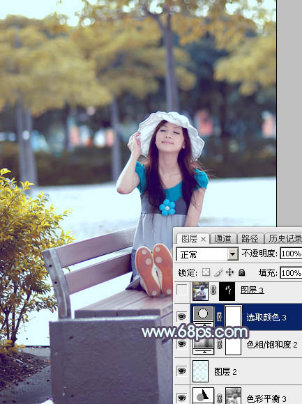 Photoshop将公园长凳上的美女图片调成秋季蓝黄色
